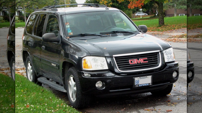 Black 2005 GMC Envoy parked