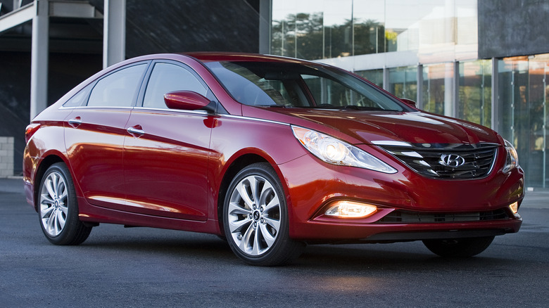 Red 2011 Hyundai Sonata parked