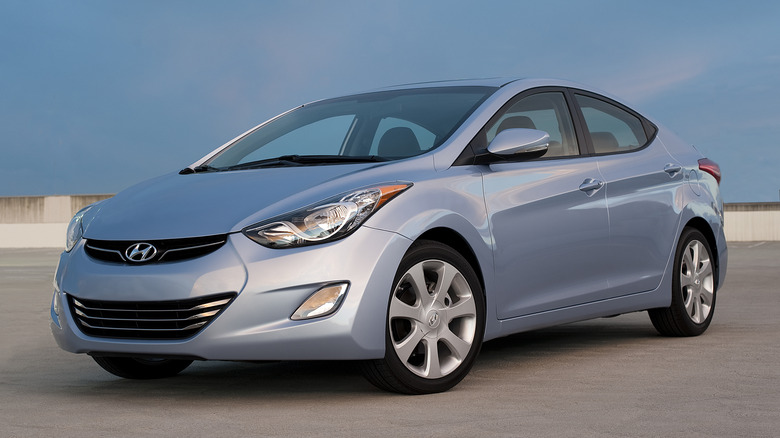 Light blue 2012 Hyundai Elantra parked