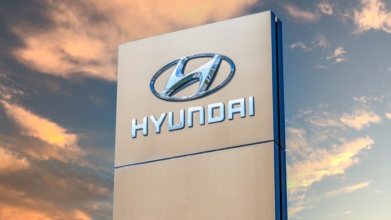 Hyundai dealership sign against the sky