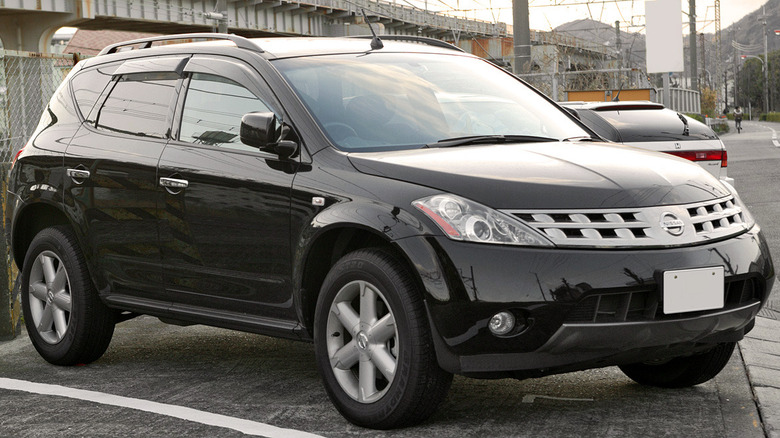 Black 2003 Nissan Murano parked