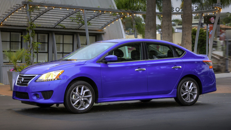 Purple 2013 Nissan Sentra parked