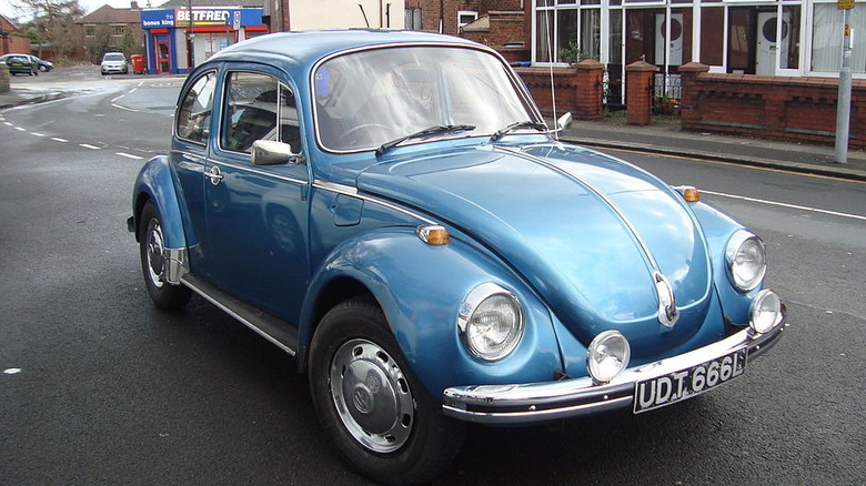 Blue 1973 Volkswagen Super Beetle on a street