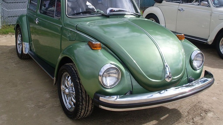 Front end of a green 1974 Super Beetle