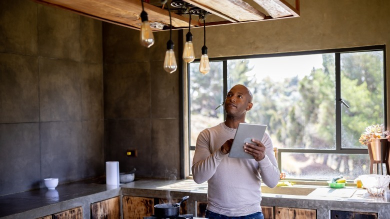 A man operating his smart home