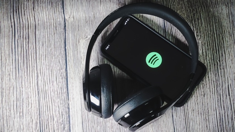 A smartphone is being used to stream music