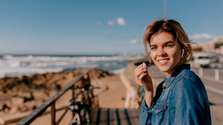 A person using AirPods