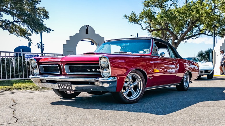 A Pontiac LeMans GTO at an auto show