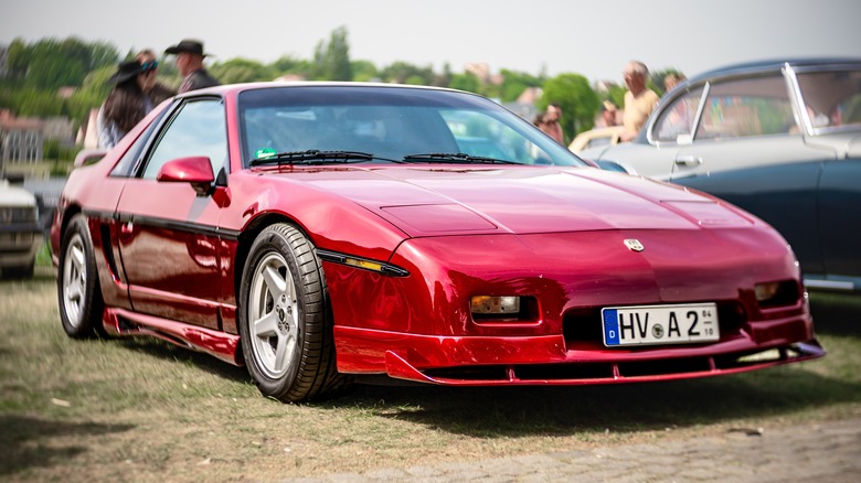 A Pontiac Fiero at a Russian auto show