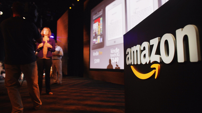 Amazon logo in front of projector screen