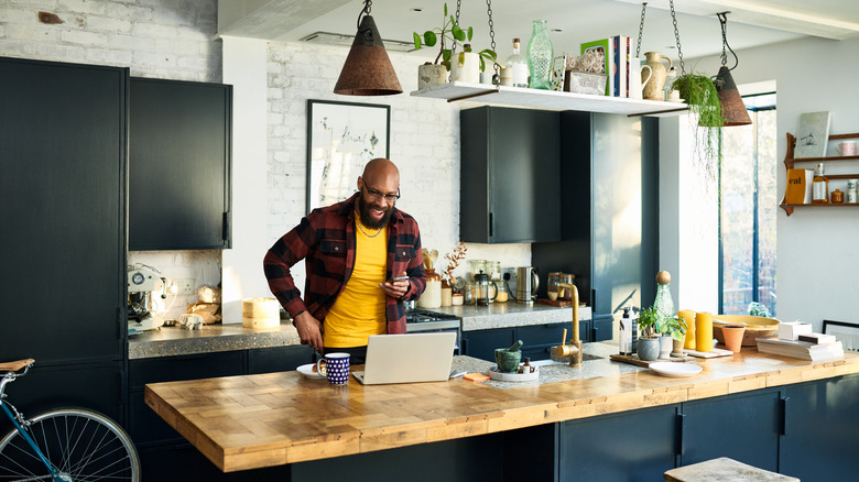 man in kitchen