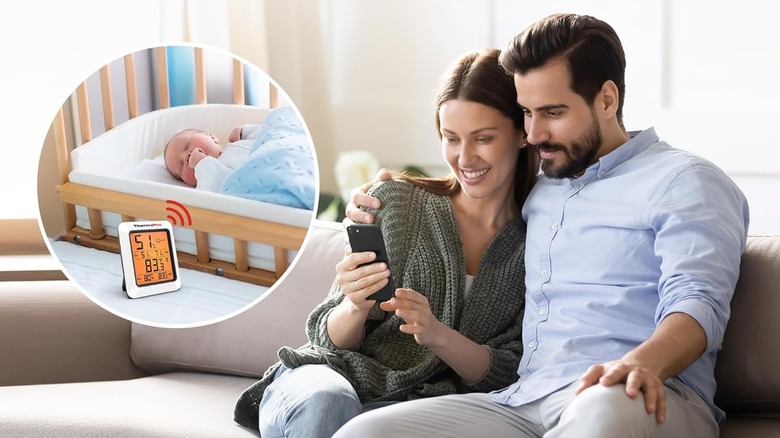 couple looking at thermo-hygrometer