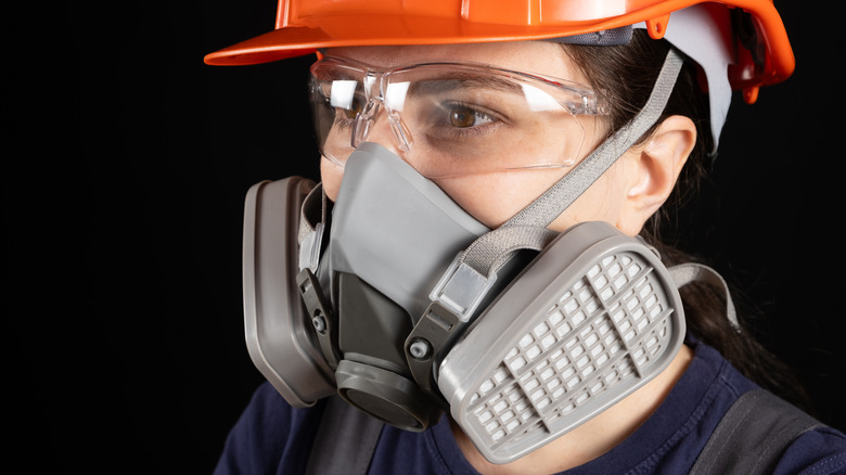 Woman wearing respirator