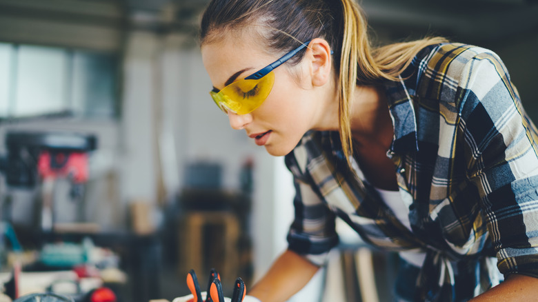 Woman wearing protective goggles