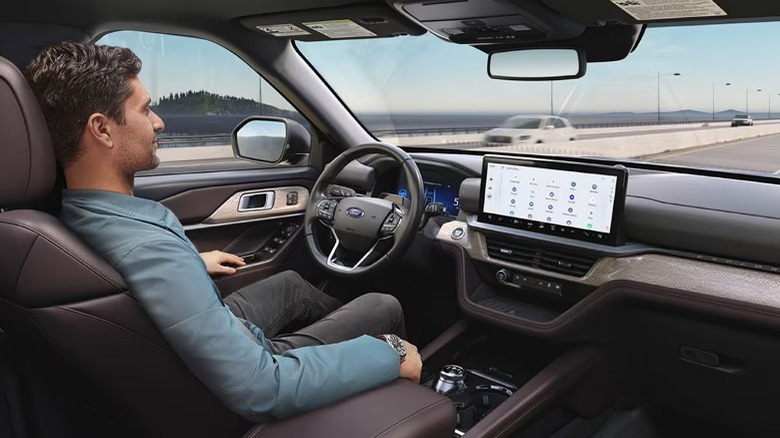 Man driving hands-free on highway