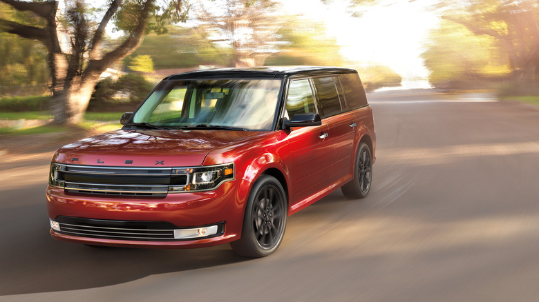 2019 Ford Flex driving at speed with blurred background