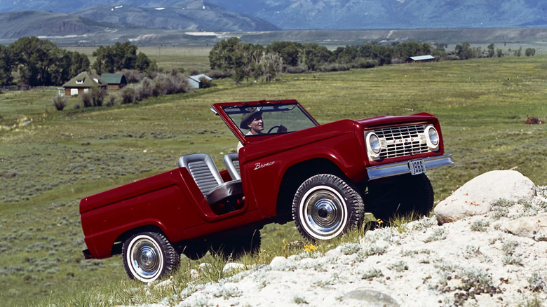 Ford Bronco first-gen roadster climbing rocks