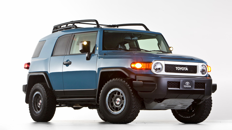 2013 Toyota FJ Cruiser SEMA Ultimate build front 3/4 view on white background