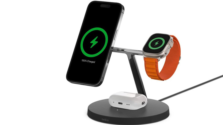 Apple iPhone, Apple Watch Ultra, and Apple AirPods charging on the Belkin 3-in-1 BoostCharge Pro