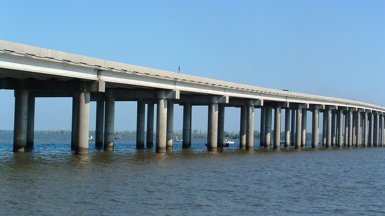 A photo of the Manchac Swamp Bridge from water level