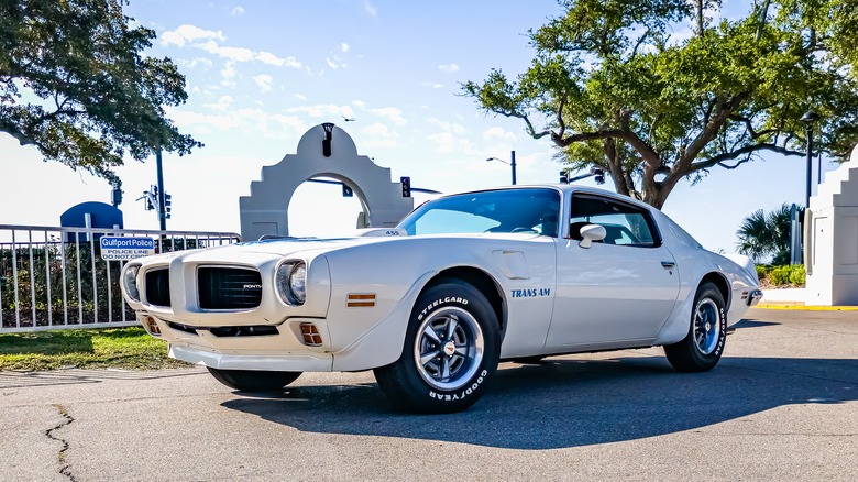 A 1973 Pontiac Firebird Trans Am at a car show