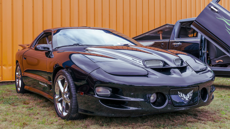 A black 1998 Pontiac Firebird Trans Am