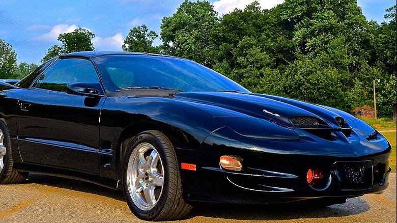 A black 2002 Pontiac Firebird Trans Am WS6 outside