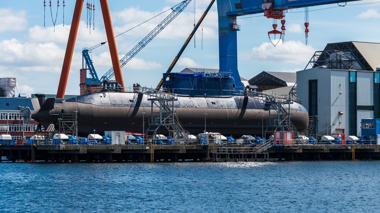 submarine being built in harbor