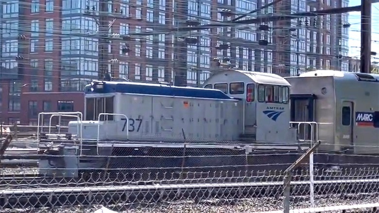 The Amtrak 737 sitting idle at a train station
