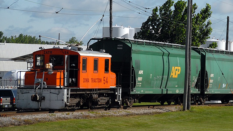 The IATR 50 hauling a cargo train car