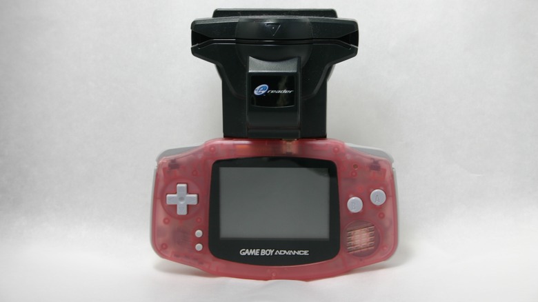 A Nintendo e-Reader connected to Game Boy Advance