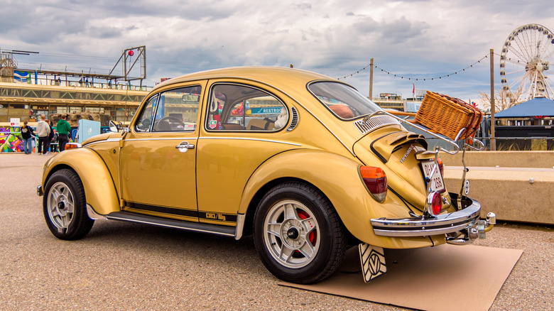 Gold VW Beetle at a car show