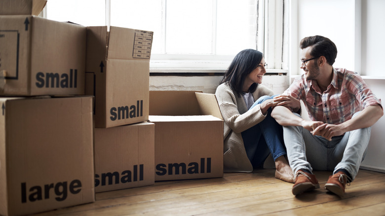 Two people in the midst of a move