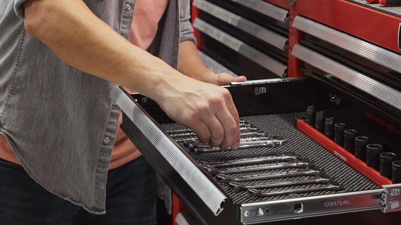 A Craftsman toolbox and hand tools