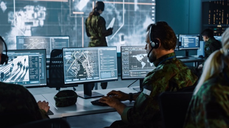 Soldiers in high-tech command room