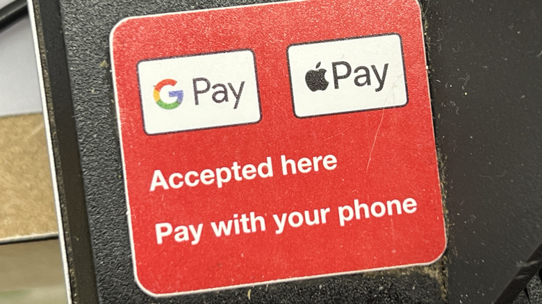 Apple Pay accepted here sign close up