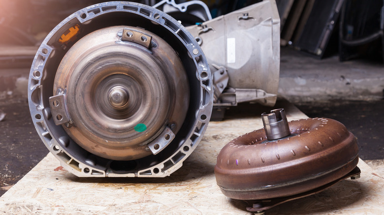 Disassembled car torque converter and its housing