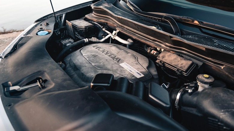 The engine bay of a late model Honda Pilot