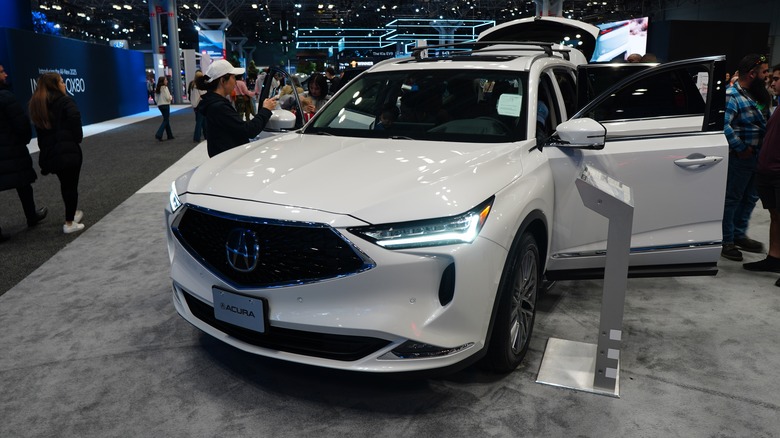 A 2024 Acura MDX on a showroom floor