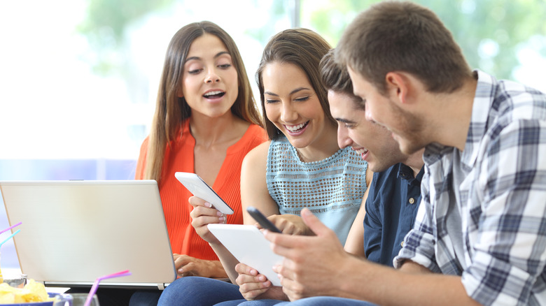 Friends browsing internet