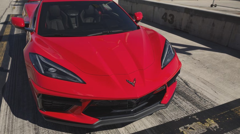 Red 2025 Chevrolet Corvette Stingray parked on track