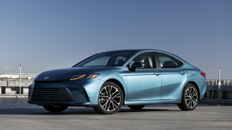 Blue 2025 Toyota Camry XLE parked