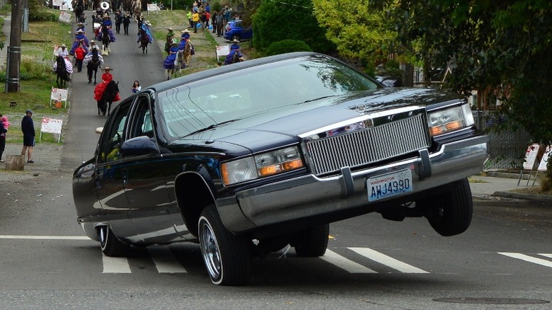 1994 Cadillac Fleetwood on 3 wheels