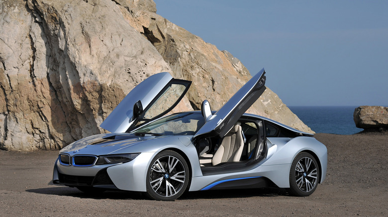 Silver BMW i8 on beach