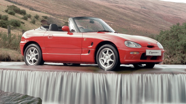 Red Suzuki Cappuccino convertible