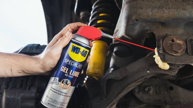 WD-40 Gel Lube spraying on a car