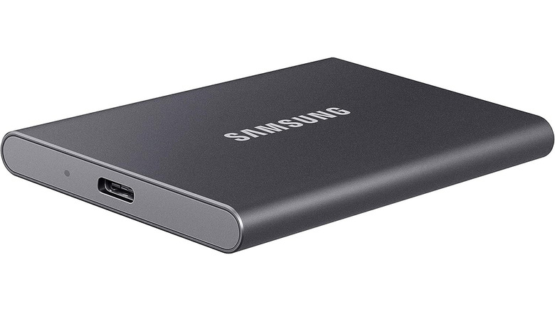 A gray Samsung T7 external SSD on a white background