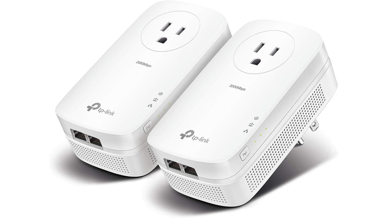 A pair of TP-Link Powerline adapters on a white background