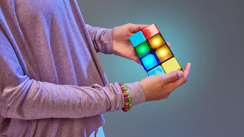 Man holding flipside toy