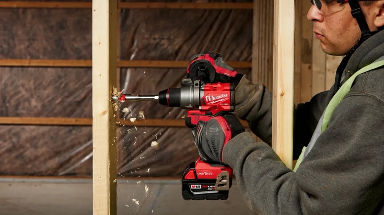 man using One-Key Hammer Drill/Driver